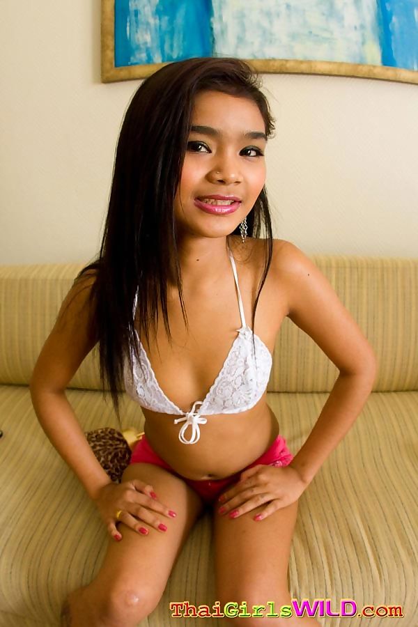 Little petite thai teen panni strips down to show off her amazing perky nipples - part 1014 page 1