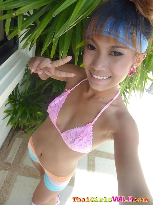 Thai hooker strips from her bikini to show her pussy - part 994 page 1
