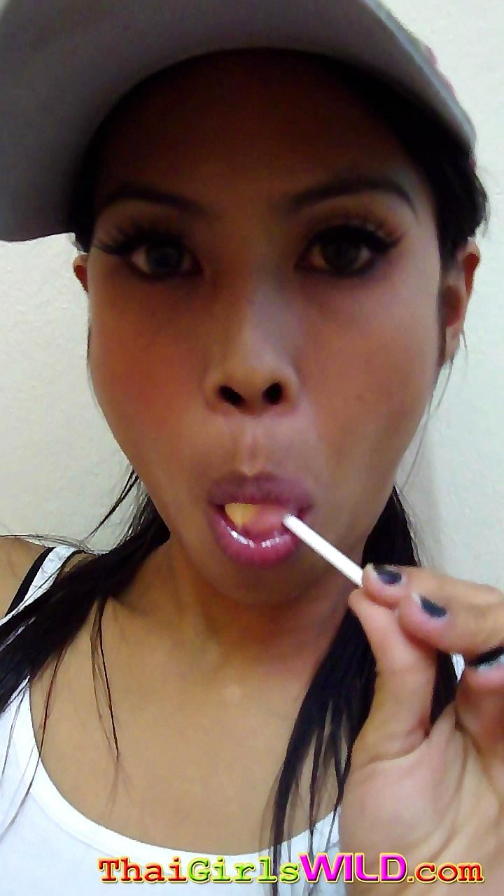 Hot thai babe named ni licks and sucks a lolipop to tease us - part 2122 page 1