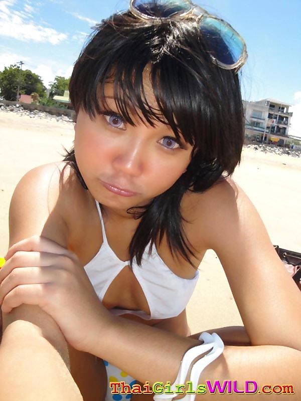 Cute little thai amateur febe poses at the beach and flashes - part 1949 page 1