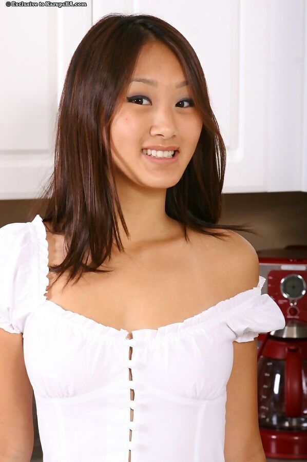 Evelyn lin asian teen strips and poses on kitchen - part 1242 page 1