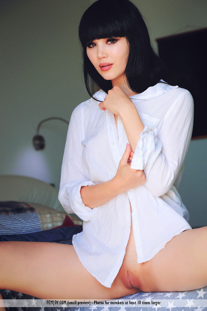 Dark haired model Malena F gets naked before donning a white blouse page 1