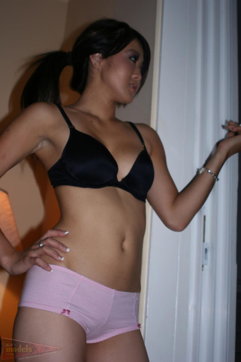 Asian first timer Taya pauses for a smoke break in her bra and panties page 1