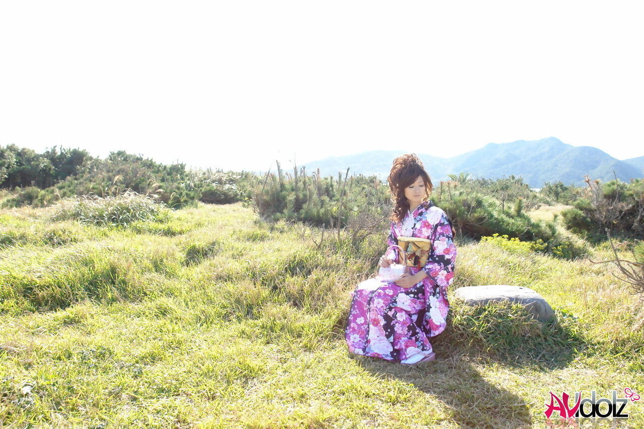 Asian model Chiaki strolls along the beach and surrounding area in a kimono page 1