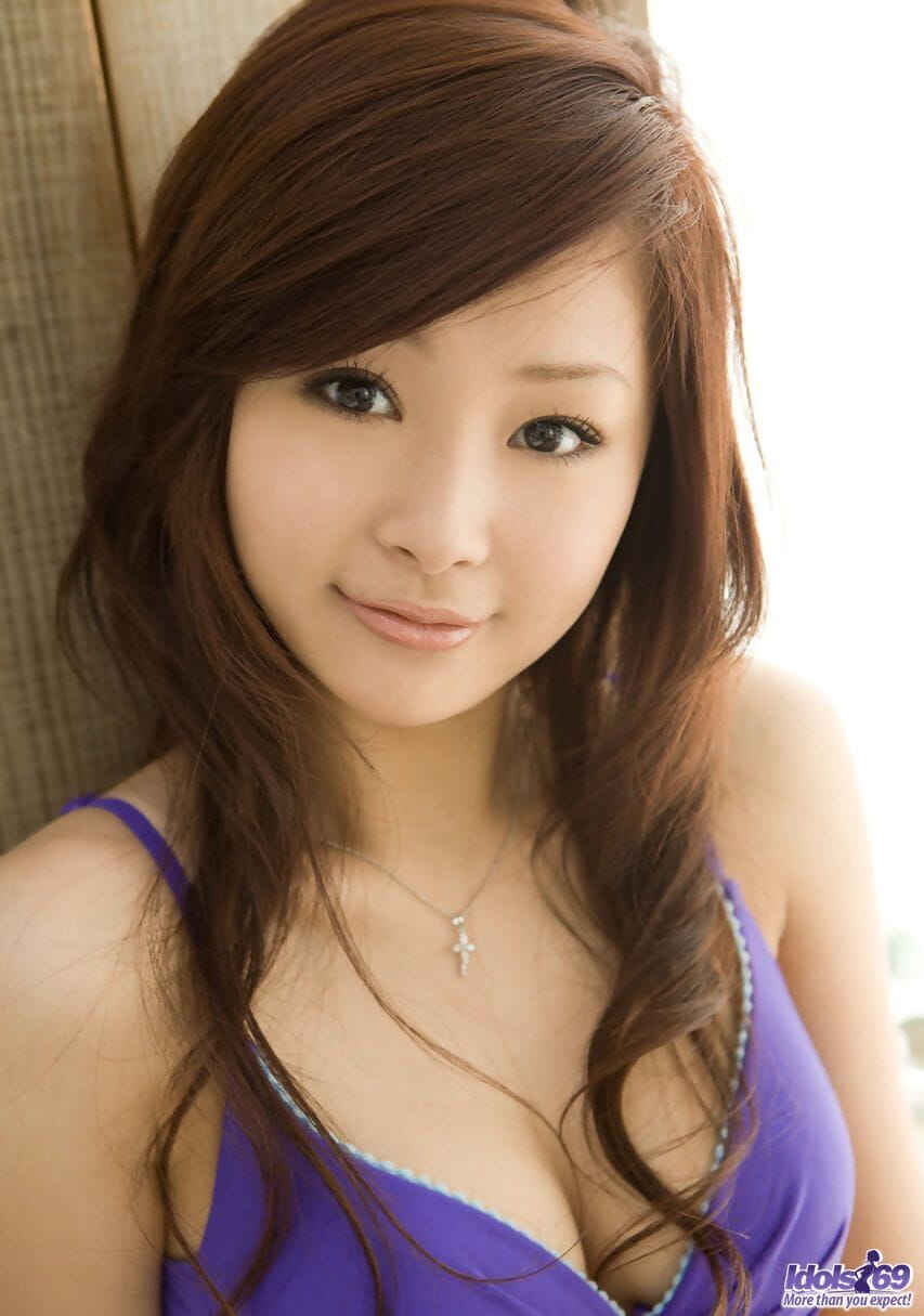 Sweet Japanese teen Suzuka Ishikawa slides panties aside to expose her bush page 1