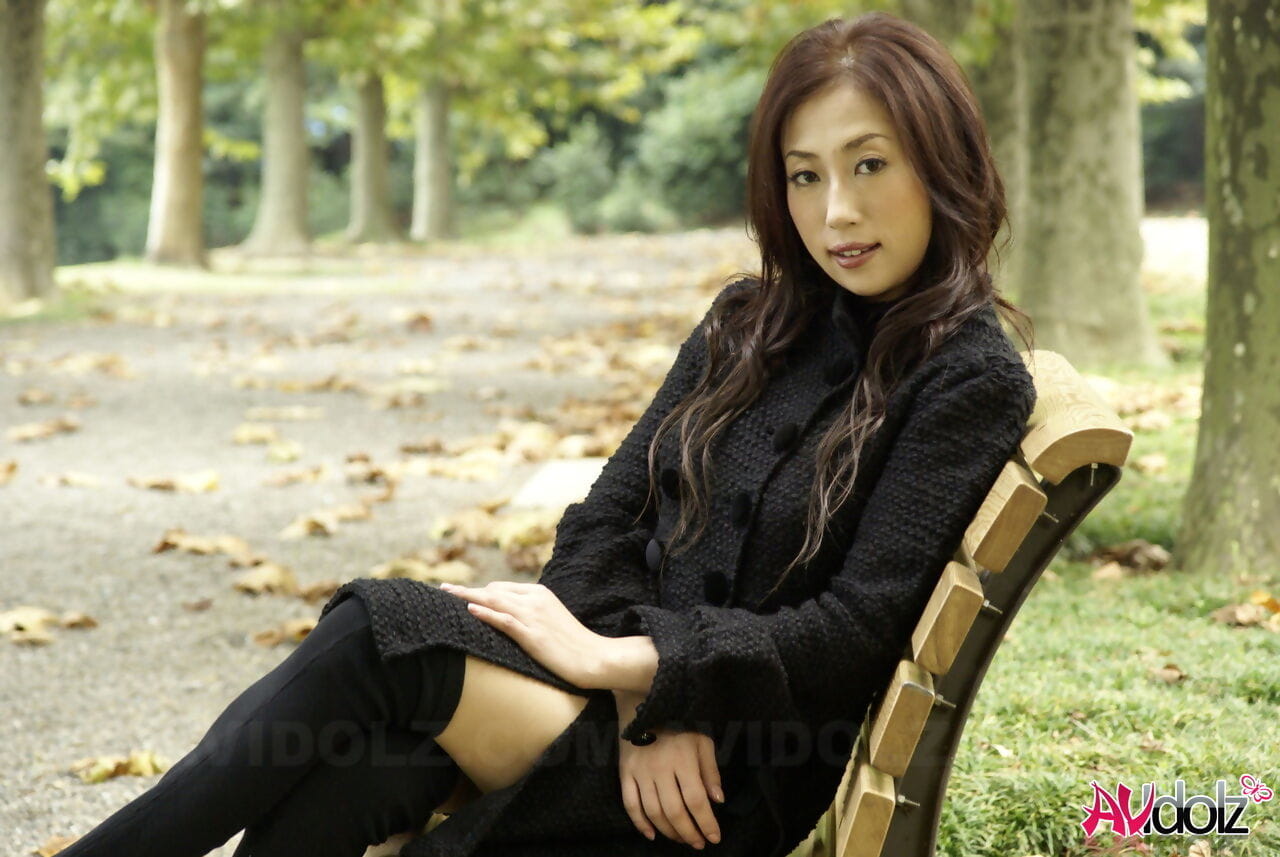 Fully clothed Japanese teen models in the park in black clothes and stockings page 1
