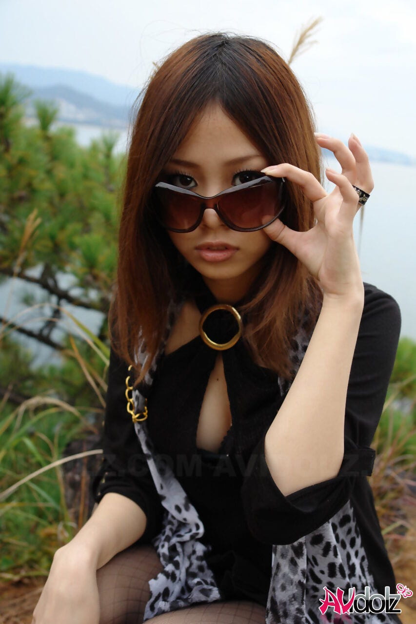 Japanese babe model Rena strips naked by the ocean in sunglasses page 1