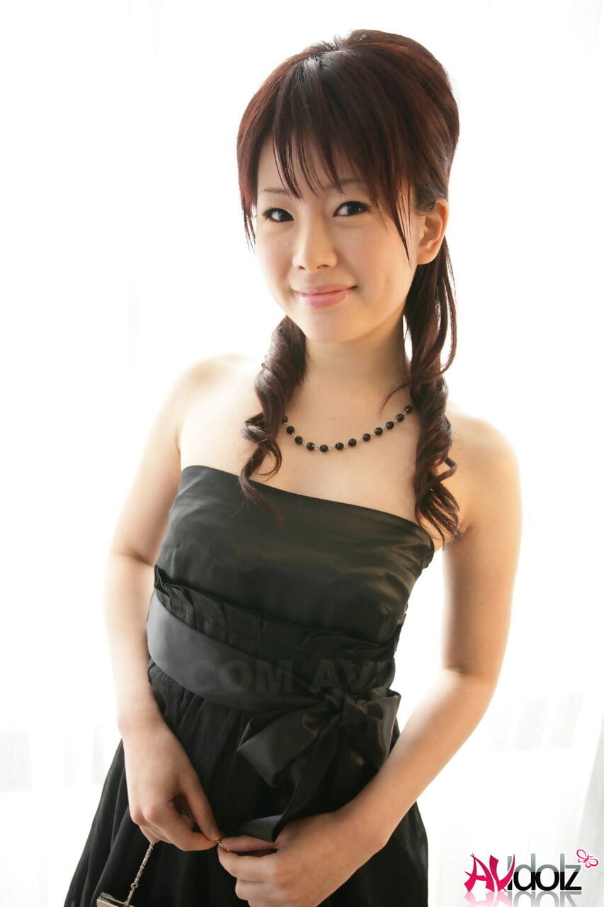 Japanese teen Hina Kawamura uncovers her tiny boobs in a black dress page 1