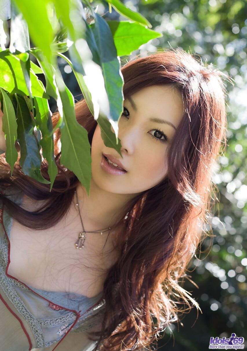 Young Japanese girl Ryo Shinohara gets totally naked in woods behind house page 1