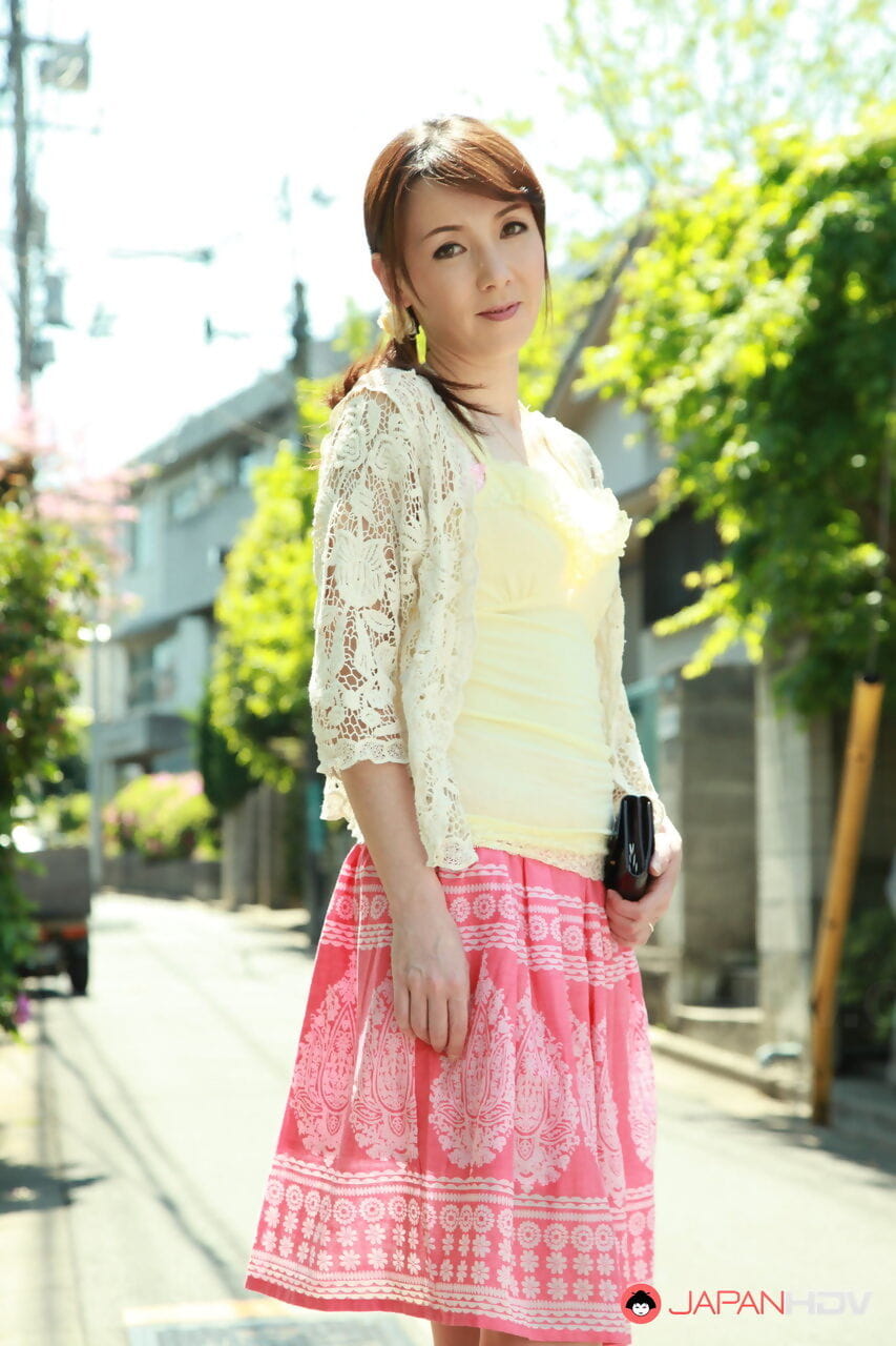 Japanese fashion model Chika Sasaki poses non nude in a knee length skirt page 1