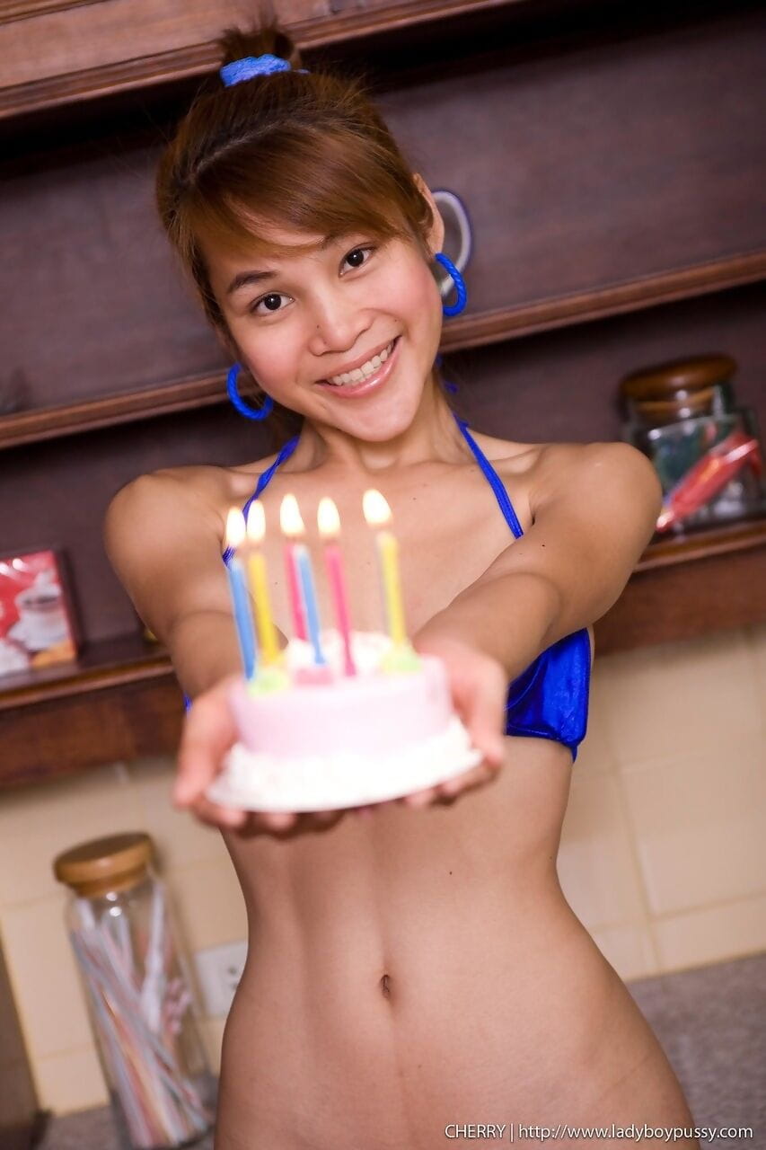 Young bikini clad Ladyboy Cherry covers her sweet ass & tits in cake to toy page 1