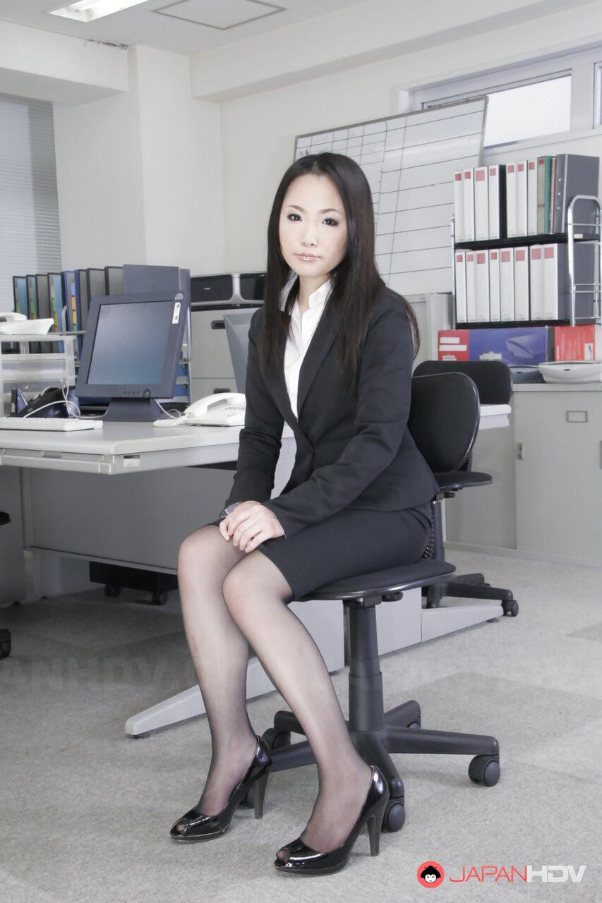 Japanese secretary Ai Mizushima models non nude at work in business attire page 1