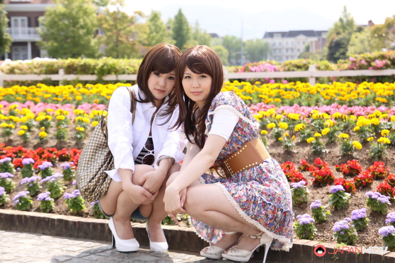 Japanese lesbians Rimu Endo & Ueno Misaki show bare legs while taking a stroll page 1