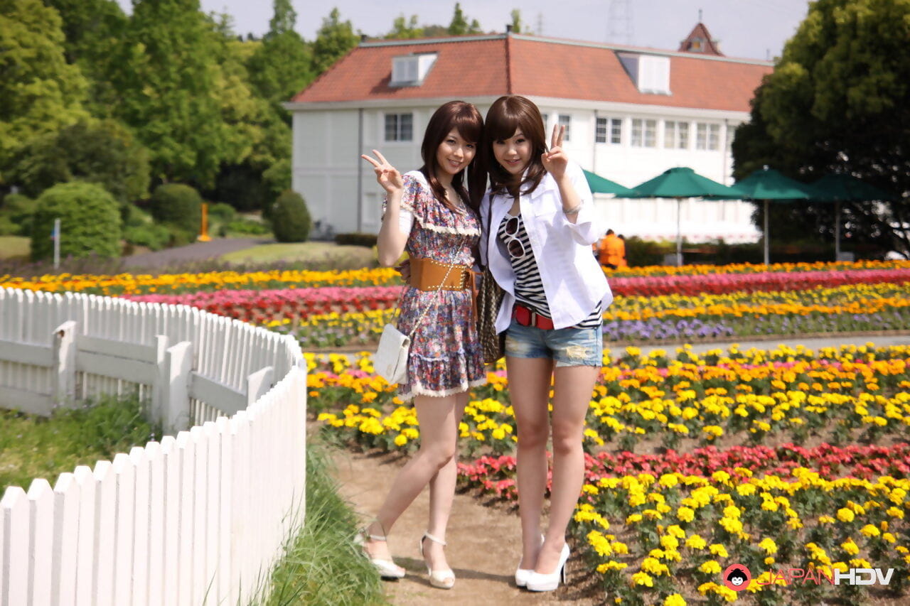 Japanese lesbians Rimu Endo & Ueno Misaki show bare legs while taking a stroll page 1