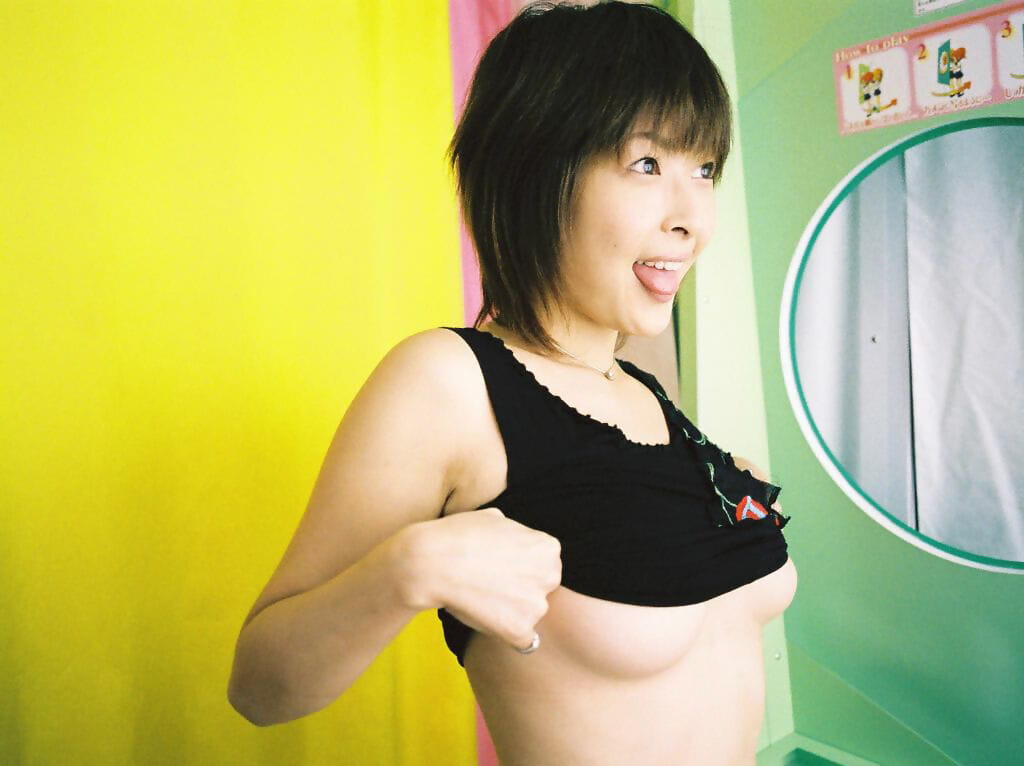 Japanese teen Nana-Natsume gets covered in suds while modeling in solo action page 1