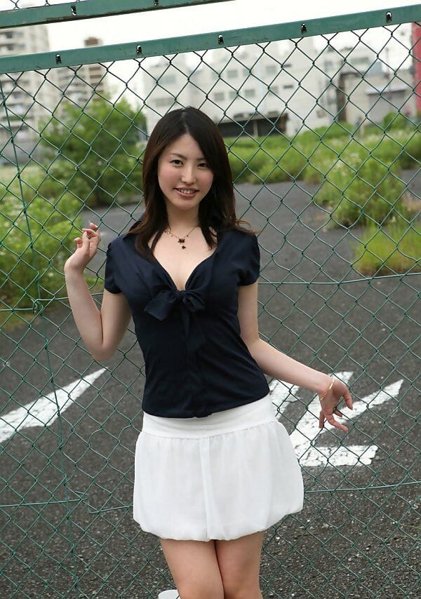 Japanese teen Takako Kitahara exposes upskirt panties on slide at playground page 1