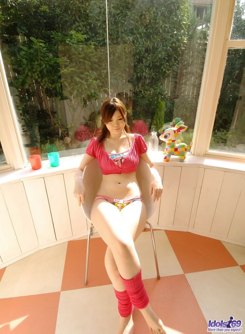 Cute Japanese girl Nami Ogawa flashes upskirt panties outside before disrobing page 1