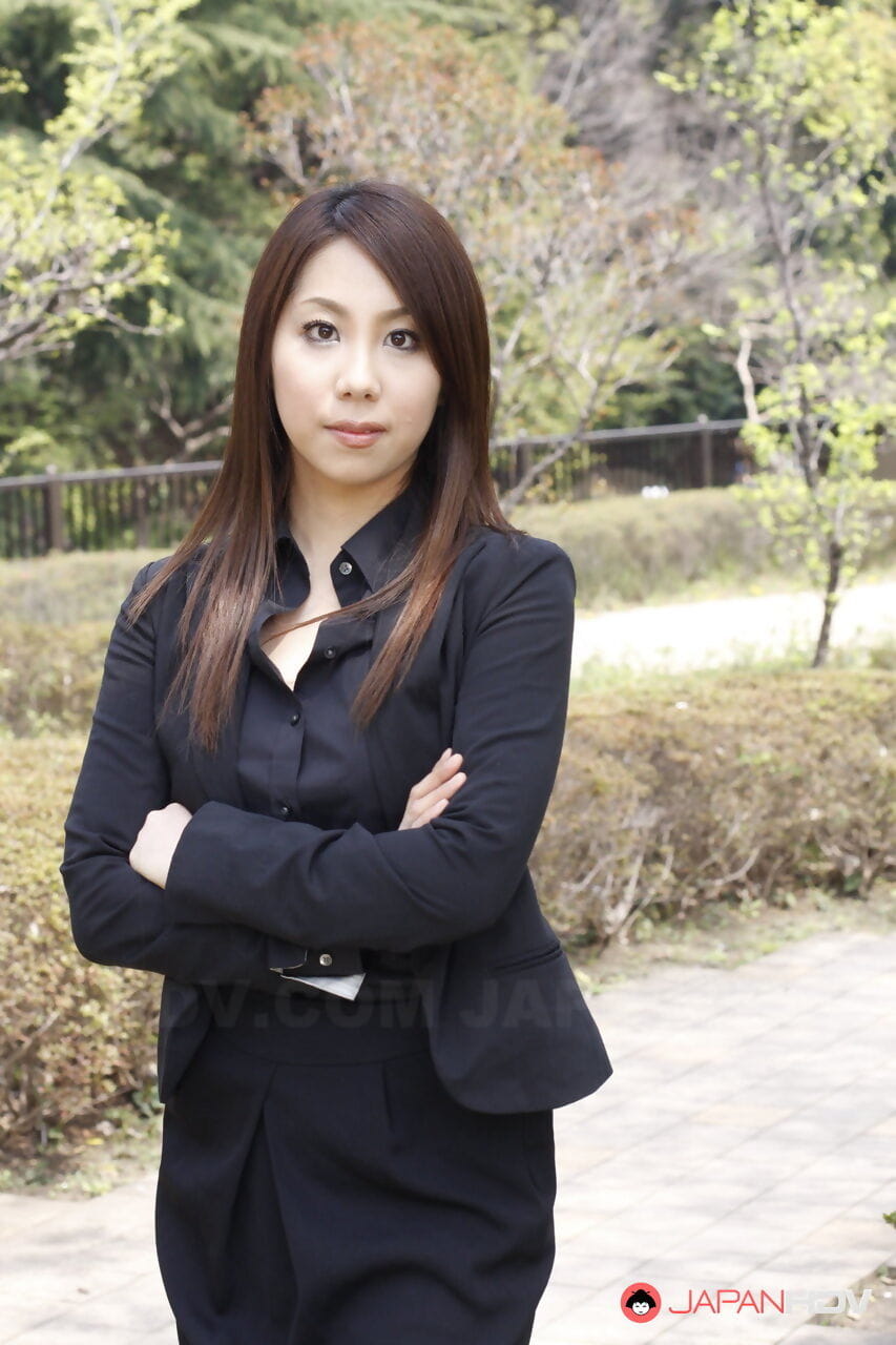 Japanese model Hikaru Matsu takes her glasses on and off in business clothing page 1