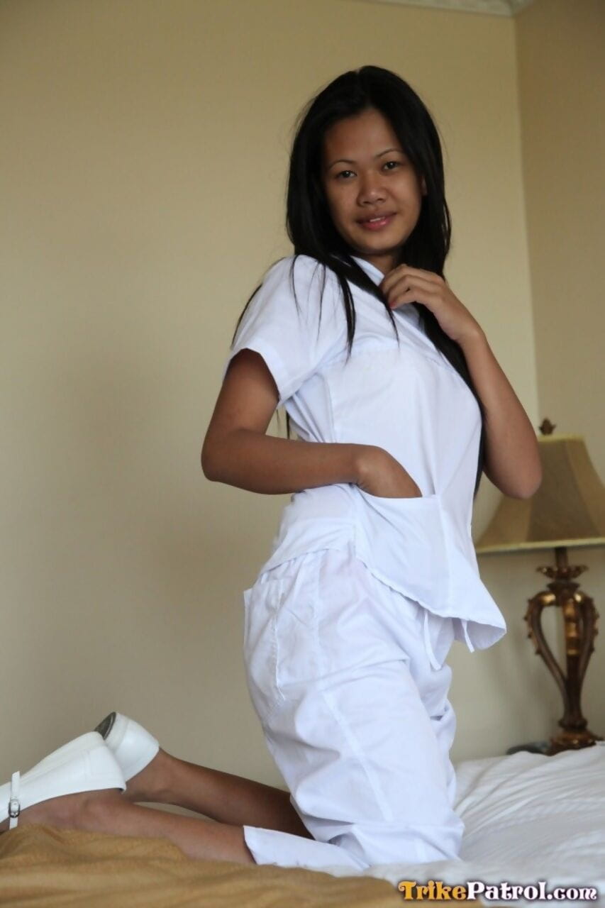 Sexy young filipina nurse Joanna doffs uniform pants to show her trimmed pussy page 1
