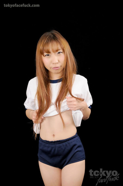 Redheaded Japanese girl masturbates after a messy face fuck