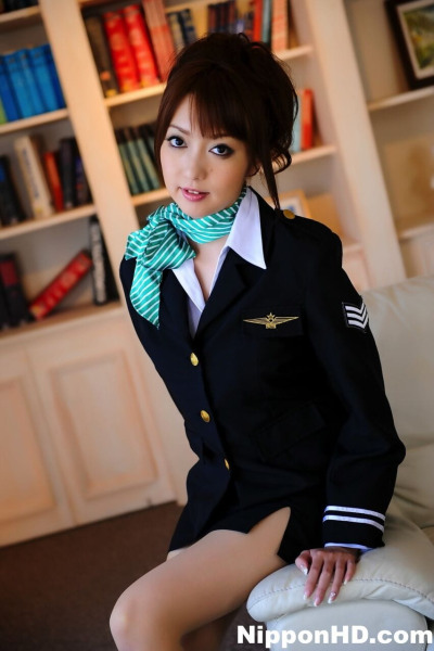 Japanese girl with a pretty face model non nude in pilot attire and pantyhose