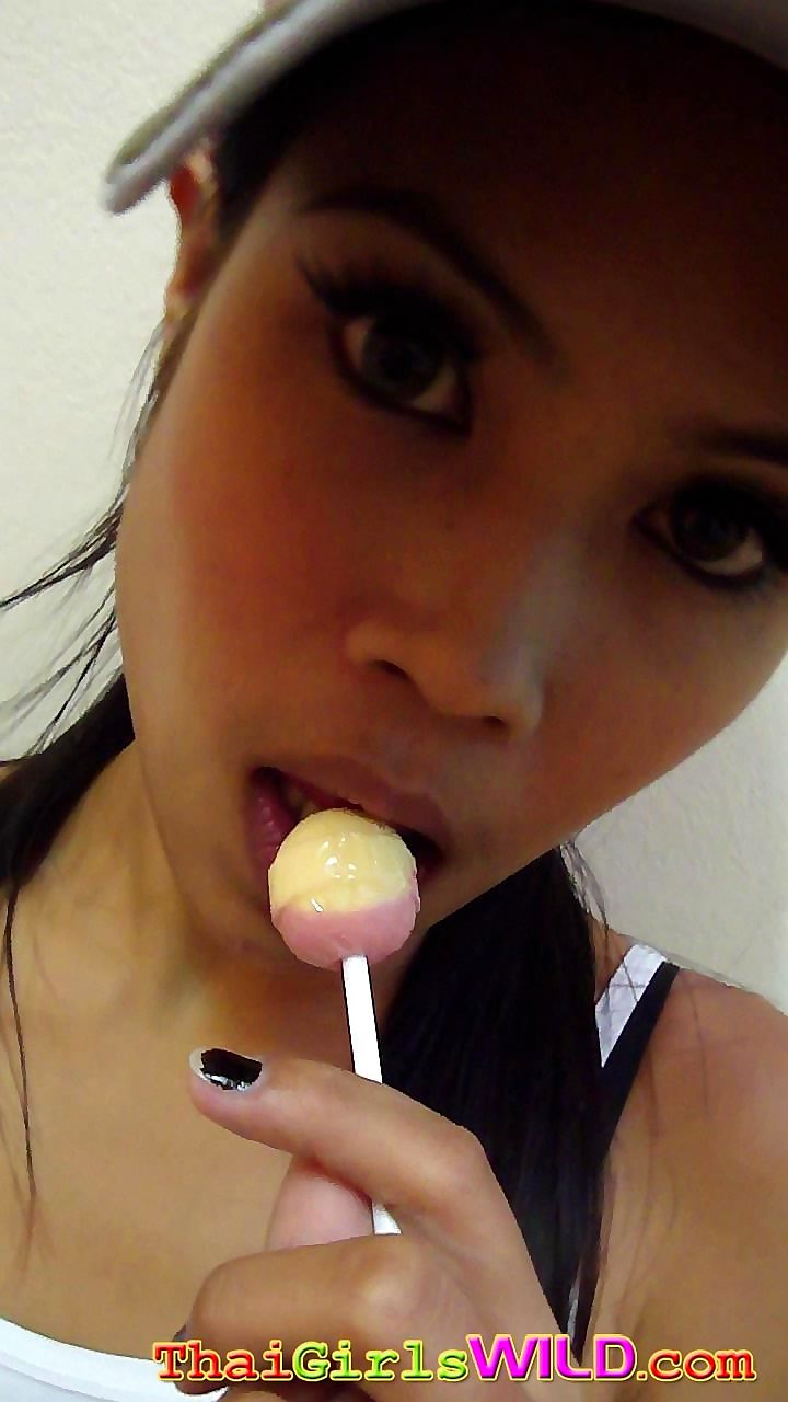 Hot thai babe named ni licks and sucks a lolipop to tease us - part 2122 page 1