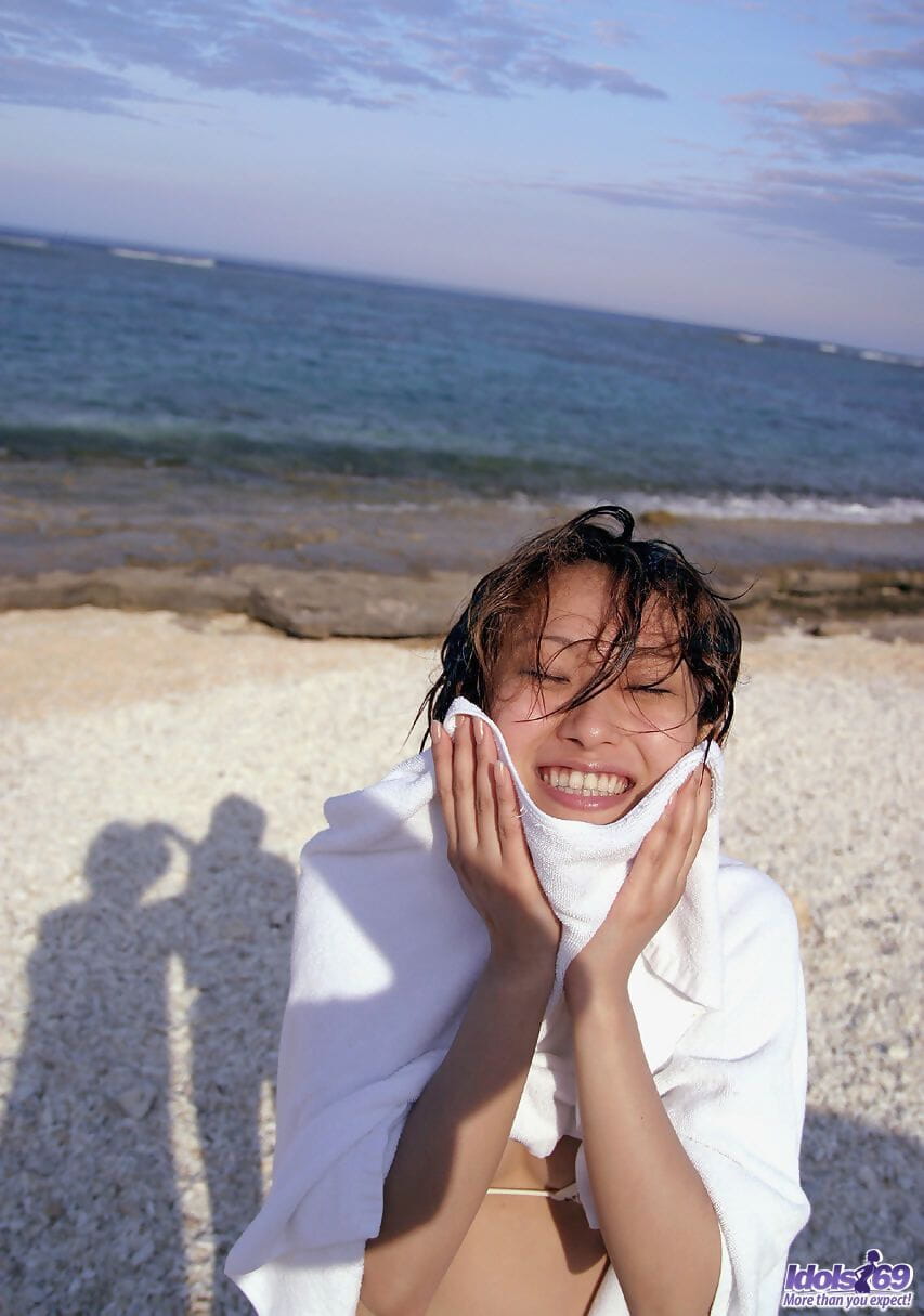 Japanese model Nao Yoshizaki goes skinny dipping while hanging at the beach page 1
