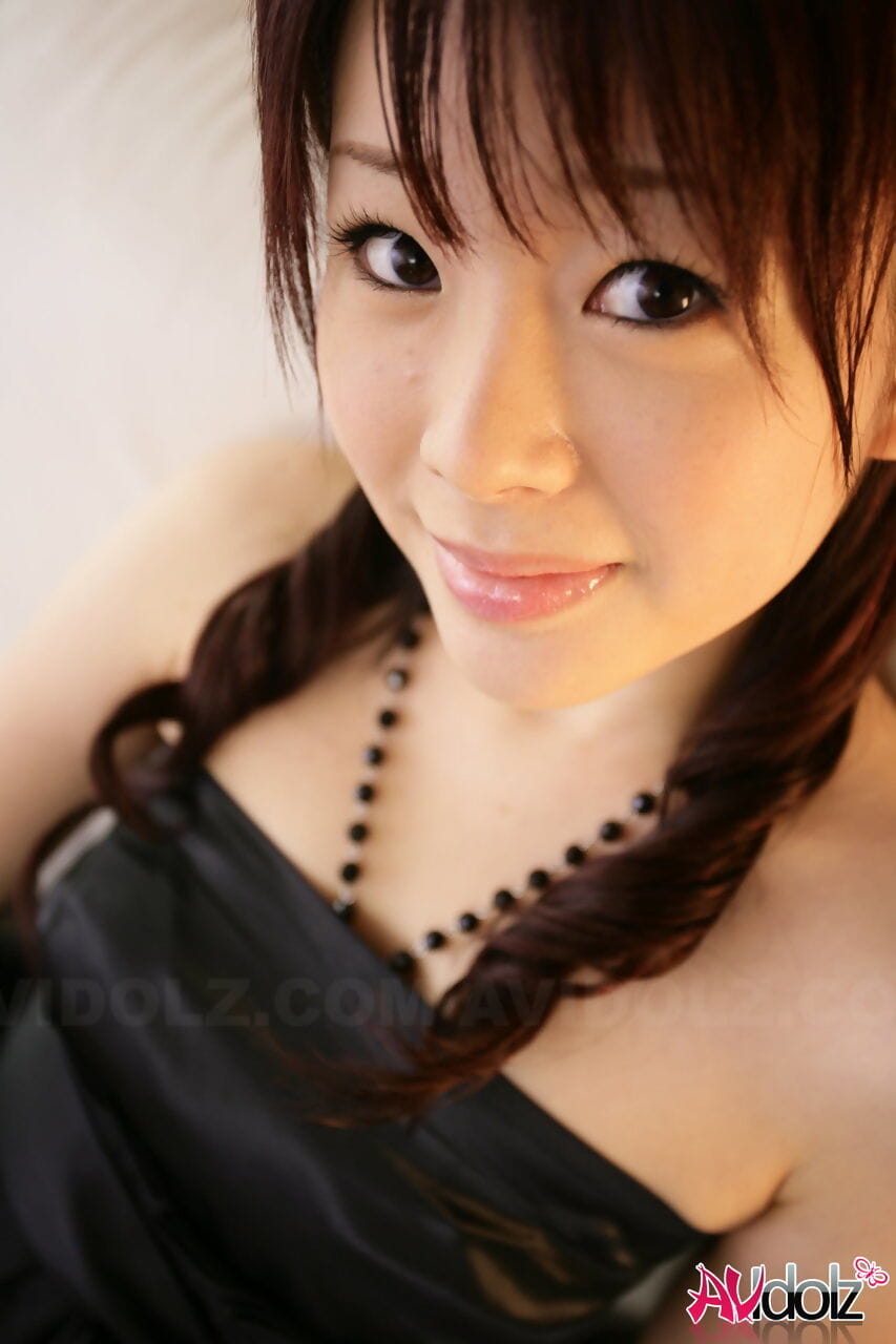 Japanese teen Hina Kawamura uncovers her tiny boobs in a black dress page 1