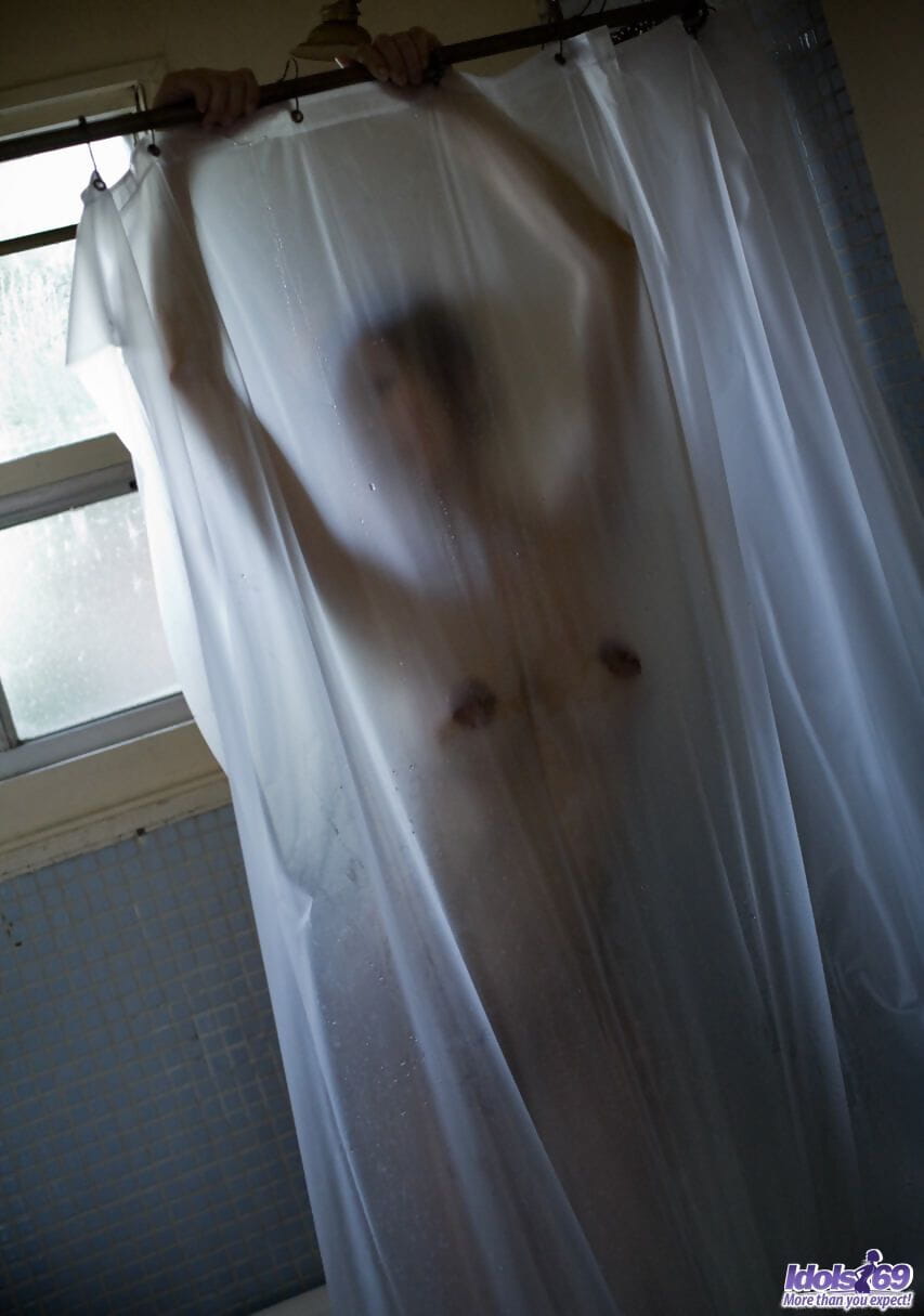 Japanese girl Emi Harukaze displays long nipples after taking a shower page 1