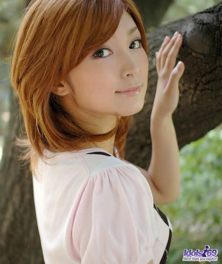 Young Japanese girl with red hair shows her upskirt underwear page 1