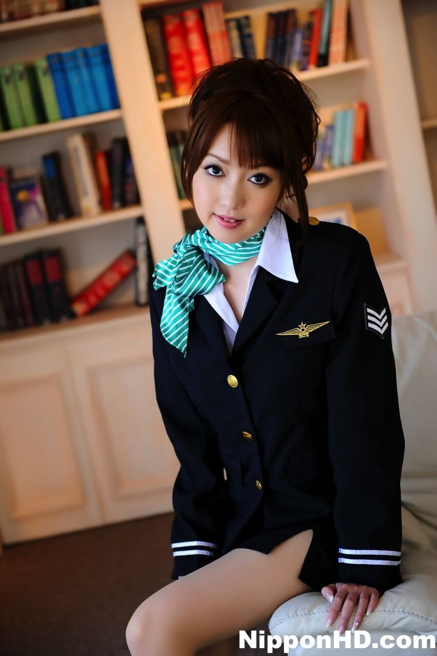 Japanese girl with a pretty face model non nude in pilot attire and pantyhose page 1