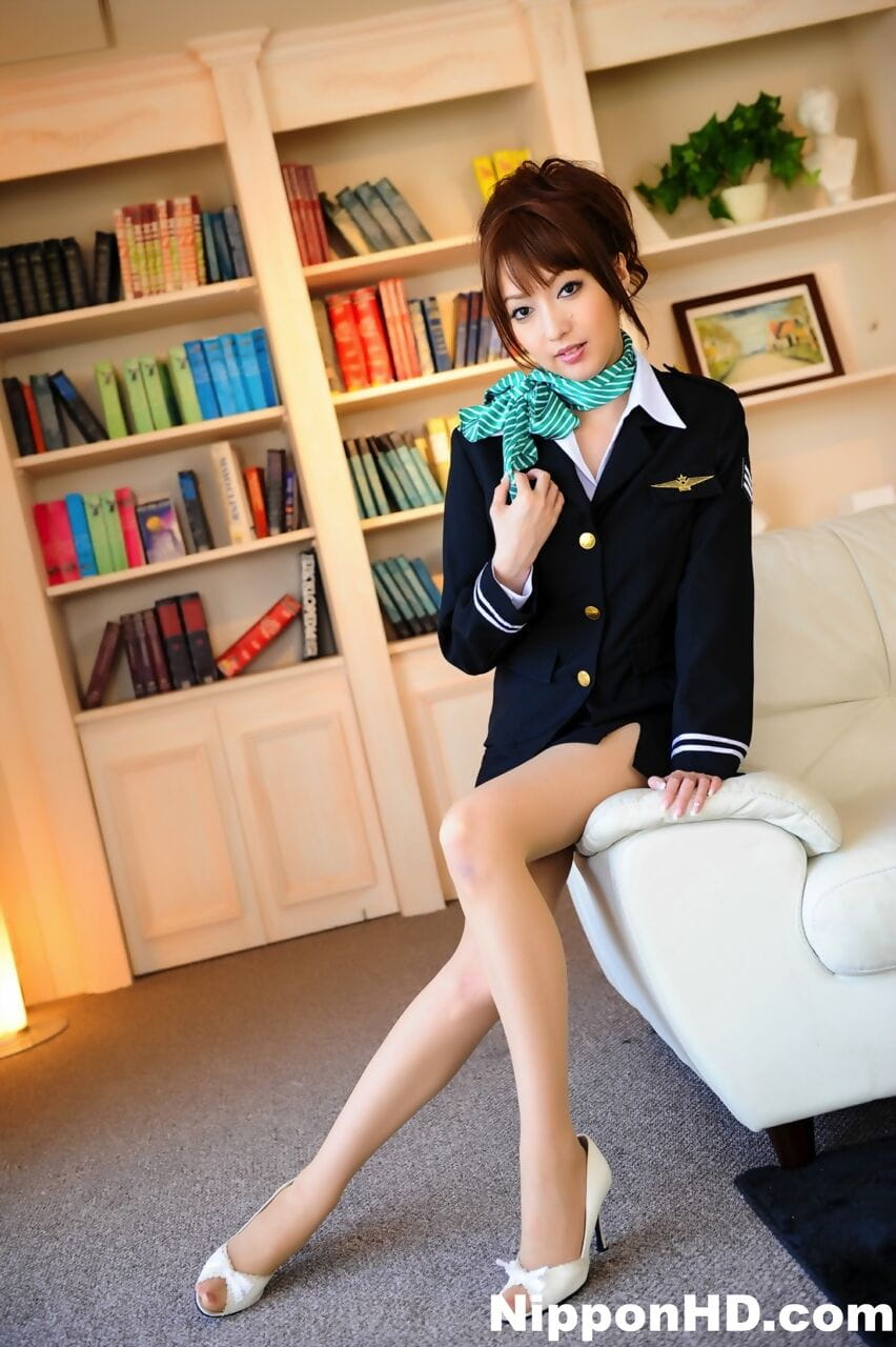 Japanese girl with a pretty face model non nude in pilot attire and pantyhose page 1