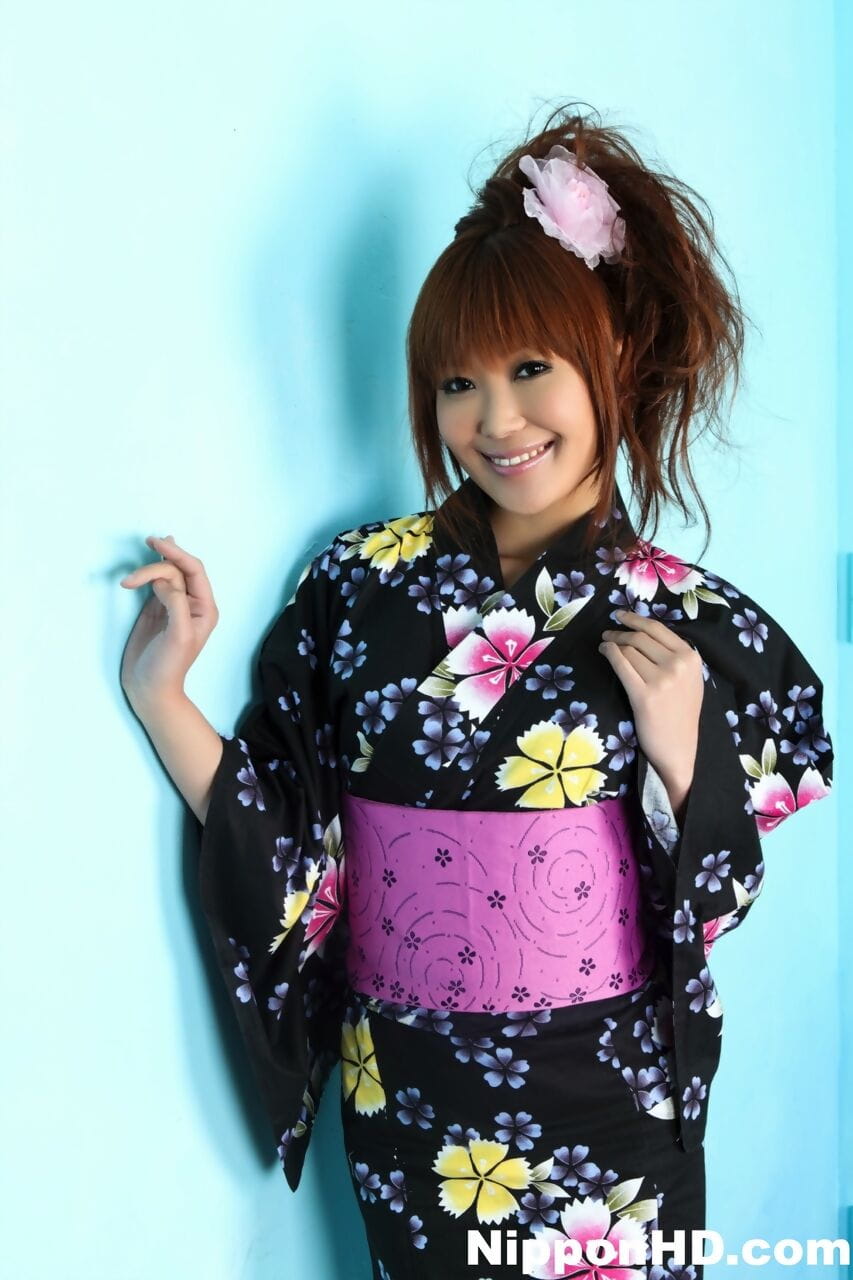 Hot Japanese model hikes her kimono to expose her satin panties page 1