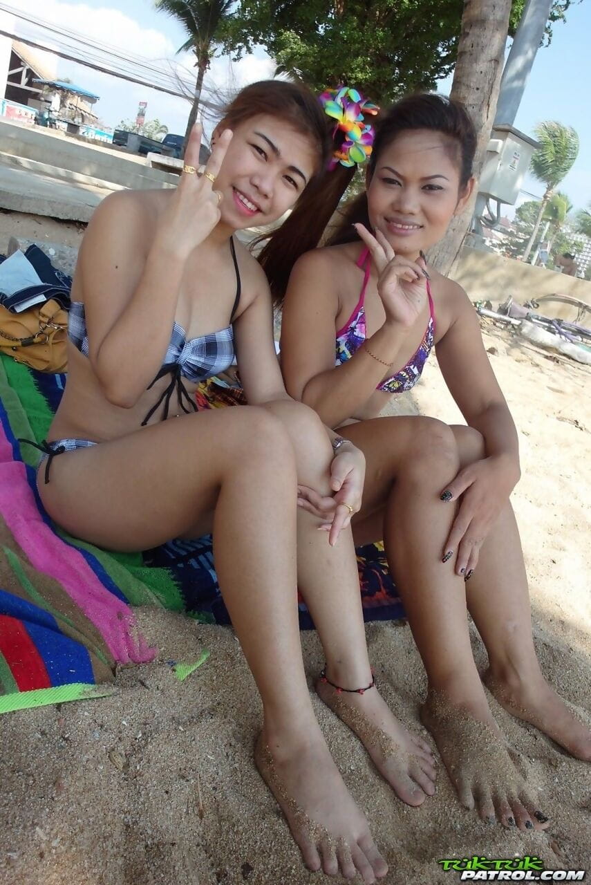 Delicious teenage Thai babes Bee and Miaw posing at the beach in hot bikinis page 1