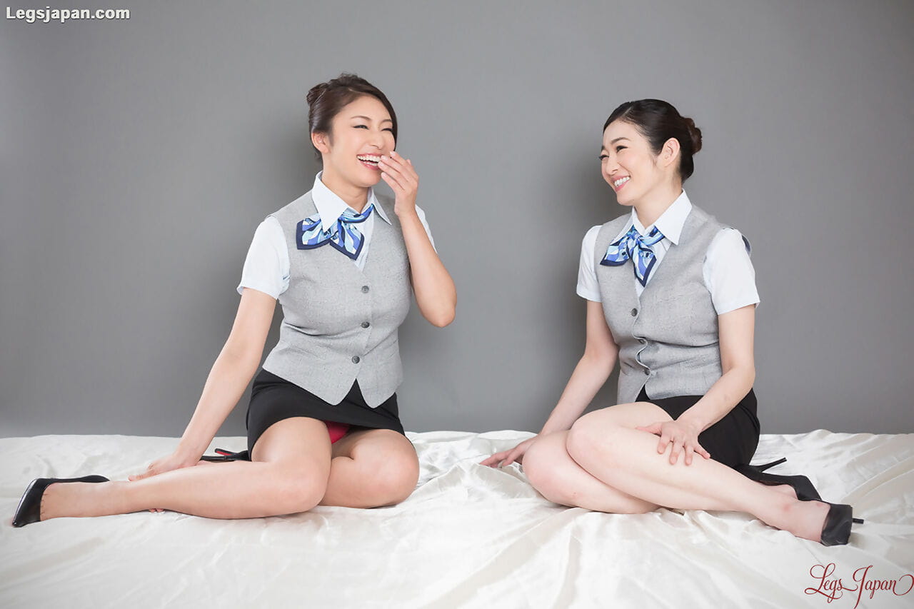 Clothed Japanese flight attendants suck on each others toes before hugging page 1