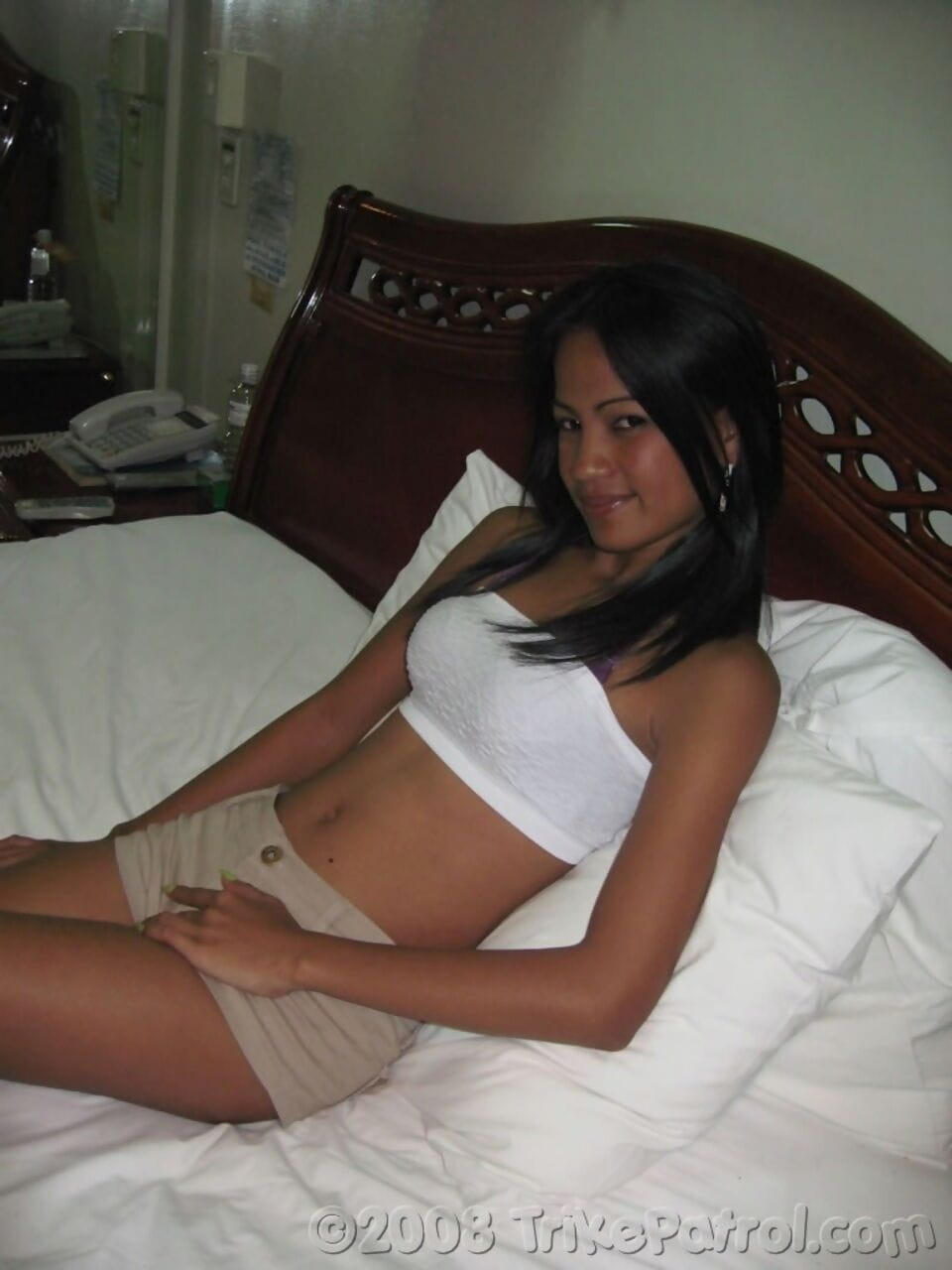 Appealing petite Filipina Linda strips nude to spread wide & suck cock page 1